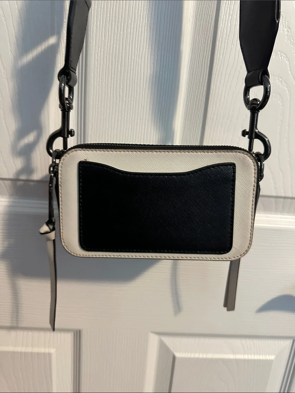 Marc Jacob’s Black and Cream Crossbody Camera Bag with Branded Strap